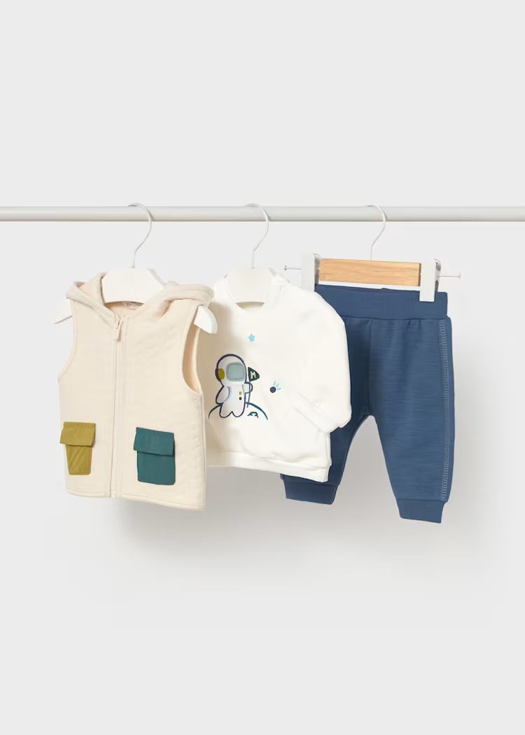 TUTA 3PZ GILET baby three-piece outfit with hooded vest, long sleeve sweatshirt, and blue pants on hangers