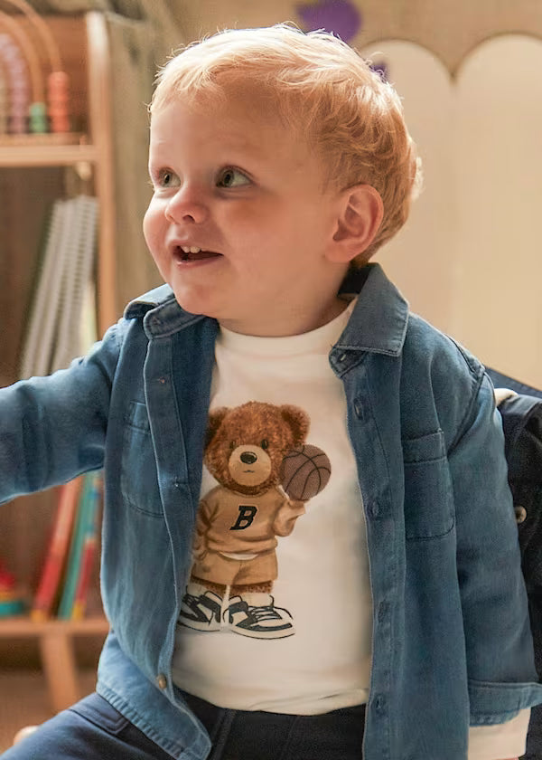 Baby boy wearing MAGLIA M/L ORSO long sleeve shirt with bear print and blue jacket