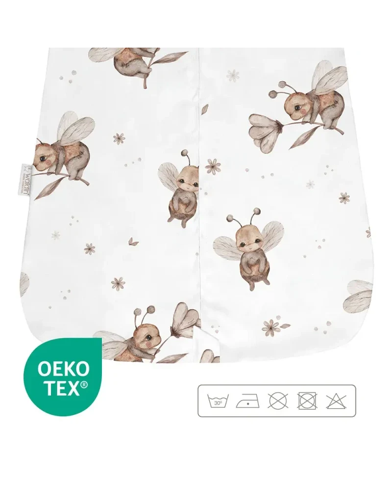 Sacco Nanna Waldin bianco in cotone con stampa di api e fiori beige e marroni, design delicato e confortevole per neonati.